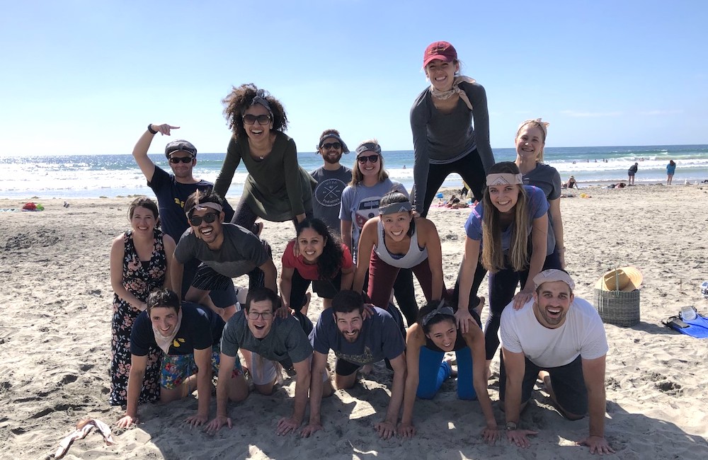 Med-Peds residents at the beach in a human pyramid